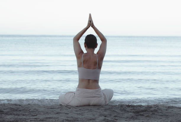 istock Yoga At The Beach 1429129888