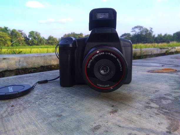 istock The black camera is placed on the asphalt road 1429130441