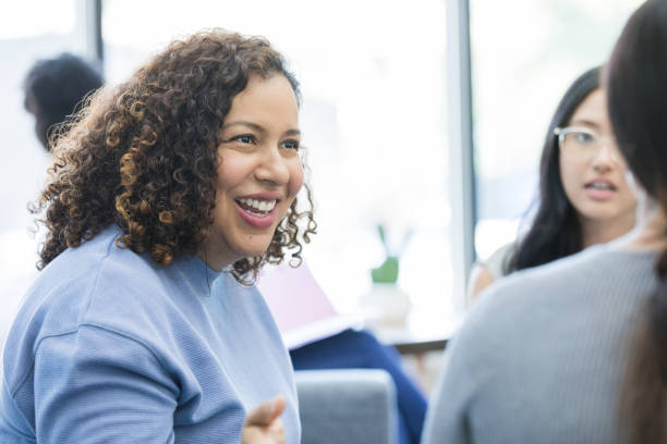 istock Female project manager validates ideas from unrecognizable team member 1429133134