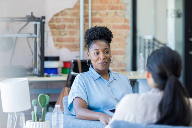 istock Cheerful small business owner interviews unrecognizable job applicant 1429133138