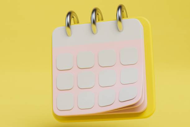 istock flip-up paper calendar on a yellow background. 3D render 1429133184