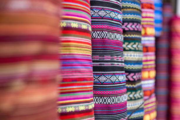 Traditionally colored and patterned fabric by the meter at the market in Chichicastenango, Guatemala