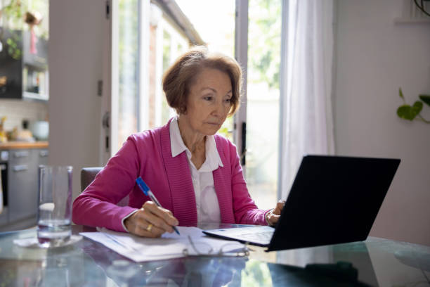 istock Active senior woman working at home 1429136004