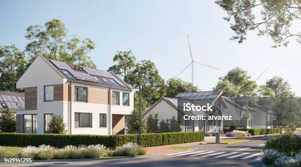 Digital Renders Of Sustainable Town With Solar Panels And Wind Energy Stock Photo - Download Image Now