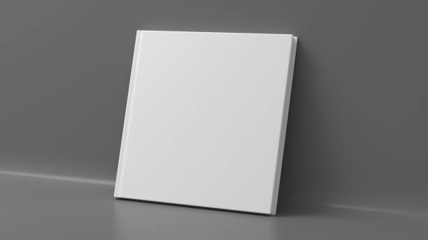 istock Blank square hardcover book cover mockup standing on gray background 1429142092
