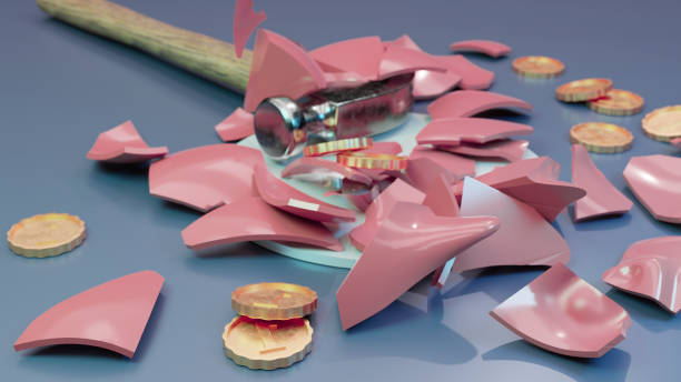 istock 3D rendered smashed piggy bank with hammer and gold coins 1429143771