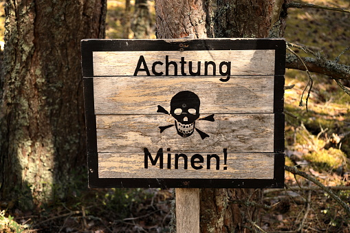 Caution, mines! warning sign