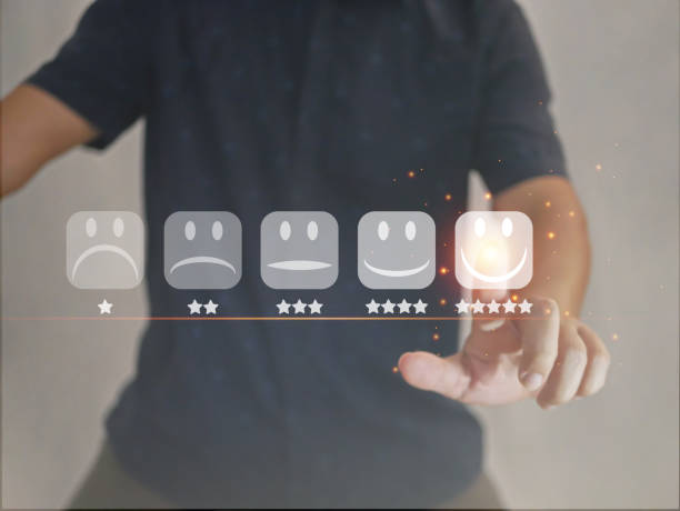 istock Customer satisfaction, very happy or impressed with service, a man finger touching a virtual screen of smiling face icon, to give feedback on service satisfaction, business rating or evaluation concept 1429160231
