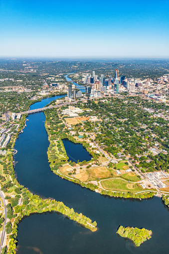 Wide angle aerial view of the downtown Austin, Texas along the Colorado River from about 2000 feet in altitude during a helicopter photo flight.