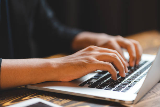 istock professional business person typing on computer laptop desk at office, using keyboard technology for working on online workplace communication job 1429179860