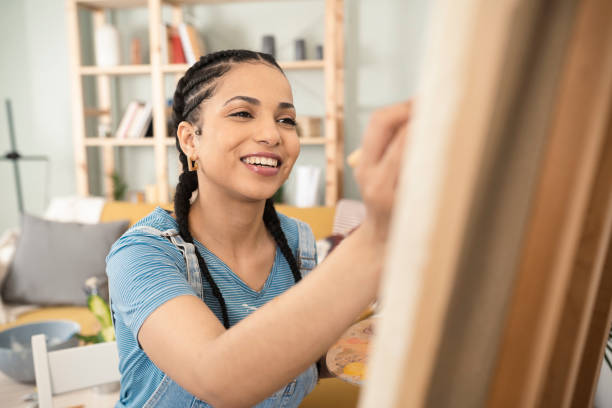 istock Beautiful painter working at her living room 1429191565