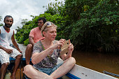 senior-caucasian-white-short-haired-woman-a-tourist-accompanied-by-two-local-guides-taking.jpg?b=1&s=170x170&k=20&c=uvPzUwNlEUHngJ-HoWUiy6ztg-8PZHvqYXg-vhCdJUI=