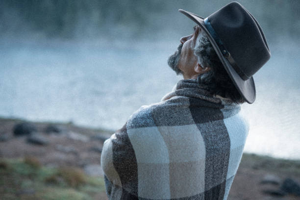 istock People and Nature. Man at lakeshore. 1429247278