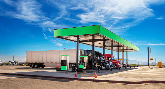 Semi trucks refueling at gas station in Texas, USA
