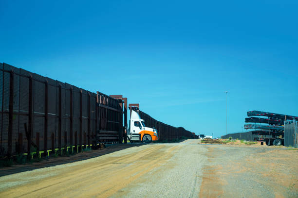 istock Semi-trucks awaiting inspection at the US-Mexico border 1429251094