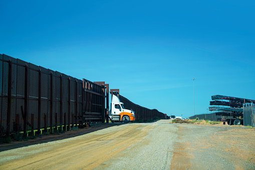 Semi-trucks awaiting inspection at the US-Mexico border