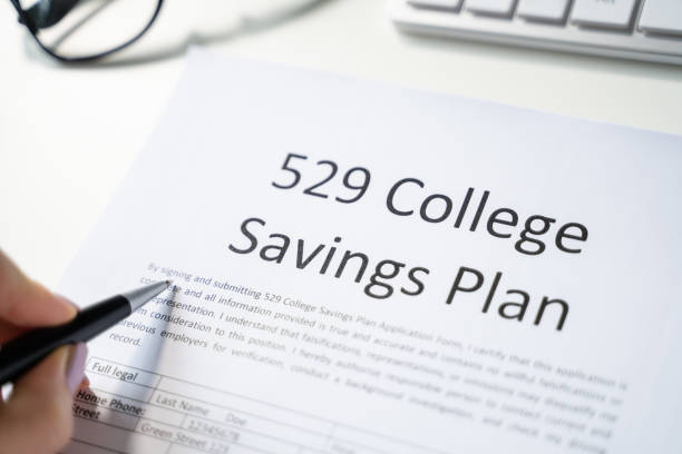 istock 529 College Savings Plan Form With Small Graduation Hat 1429256214