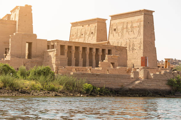 istock Egyptian temple situated on a bank river 1429256538