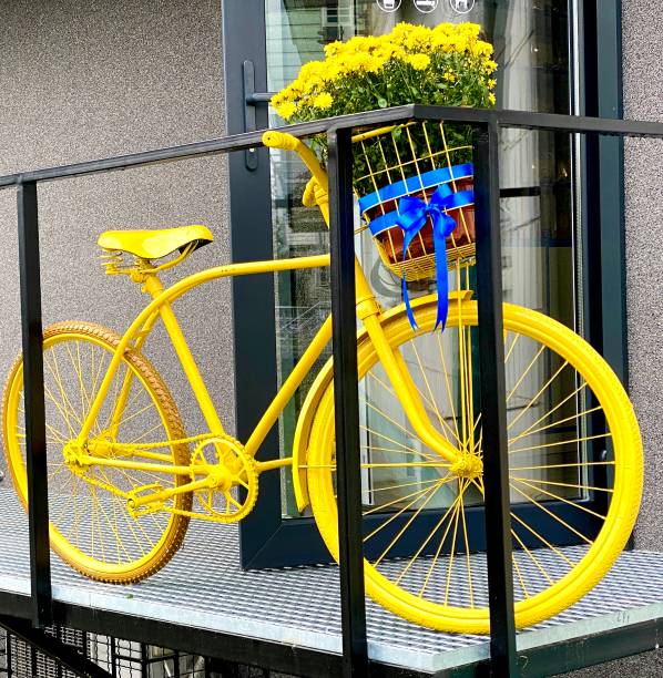 istock yellow bicycle with flowers 1429262941