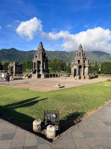 istock Local tourists visit Arjuna temple complex at Dieng Plateau 1429267388