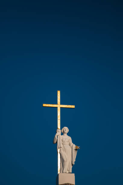 istock Cross bright in the rays of the sun - holy light 1429270418