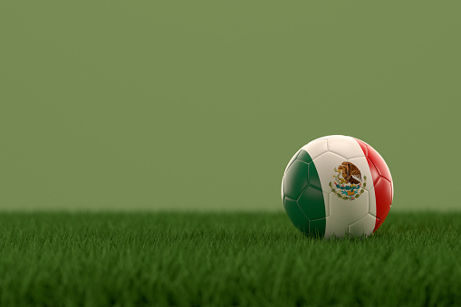3d rendering of soccer ball with Mexico flag on a grass field.