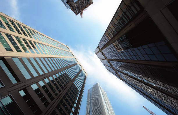 Urban abstract background, detail of modern glass facade, office business building