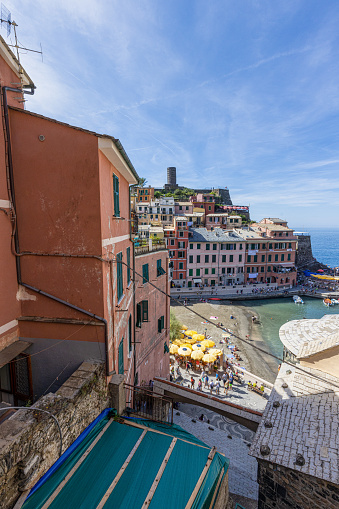Panorama over the historic coastal village of Manarola in the Cinque Terre National Park on the Ligurian coast during the day in summer