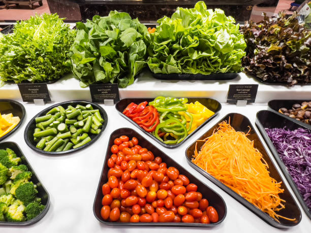istock Vegetables and grains on the salad bar counter 1429283756