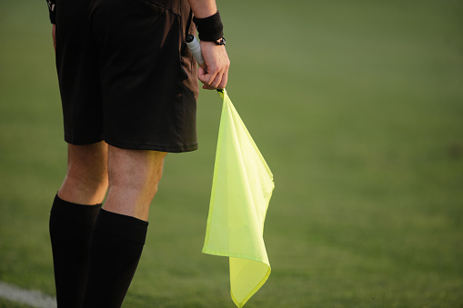 Giurgiu, Romania - June 29, 2020: Details of a linesman referee during a soccer game
