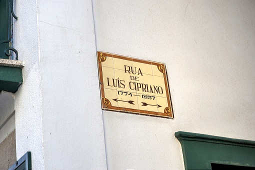 Aveiro, Portugal - August 14, 2022: Ceramic tile street signage for Rua De Luis Cipriano