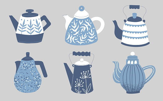 a set of painted ceramic teapots. Blue porcelain painted teapots with patterns of different shapes