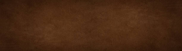 istock Old brown dark rustic leather - Suede, buckskin background banner panorama long 1429288077