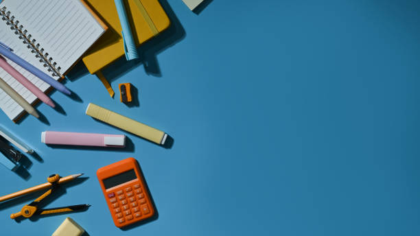 istock Various school supplies on a blue background with copy space ready for your design. Top view, Flat lay. 1429288175