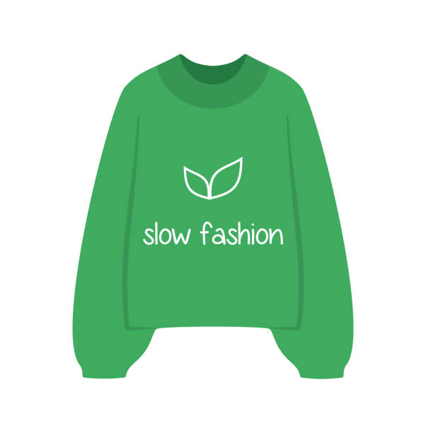 Green sweater with the inscription slow fashion and leaves on a white background. Flat vector illustration Green sweater with the inscription slow fashion and leaves on a white background. Flat vector illustration sustainable fashion stock illustrations