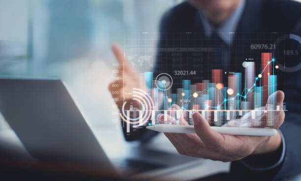 istock Businessman analyzing financial data, economic growth graph chart on digital tablet. Business planning and strategy. Analysing trading of exchange, financial report. Finance and investment 1429292765