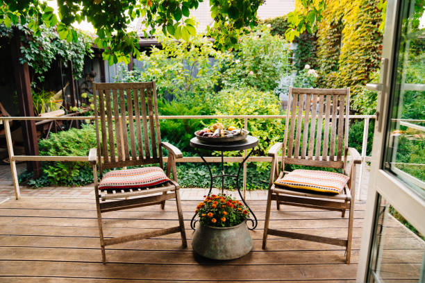 istock a small round table for tea drinking and two wooden armchairs on the terrace 1429297766