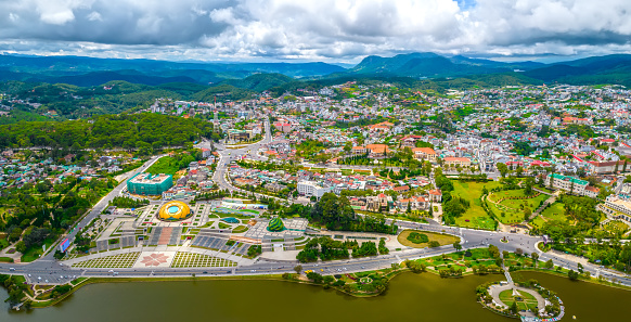 Aerial panorama view of Sunflower Building at Lam Vien Square in Da Lat City. Tourist city in developed Vietnam. Center Square of Da Lat city with Xuan Huong lake.
