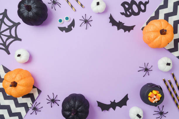 istock Halloween border frame background  with pumpkin and decorations. Halloween party concept. Top view, flat lay 1429305530