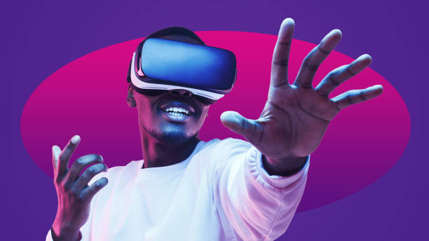 istock Young african metaverse user wearing virtual reality headset, playing new VR game online 1429305865