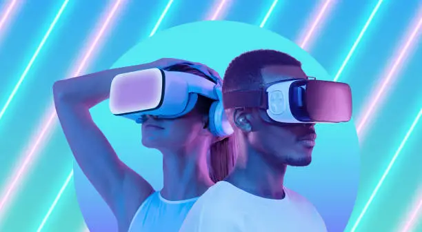 Photo of Metaverse people, banner young man and woman in VR headsets exploring virtual reality game world