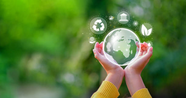 CO2 emission reduction concept in hand with environmental icons, global warming, sustainable development, CO2 Net-Zero Emission - Carbon Neutrality concept. stock photo