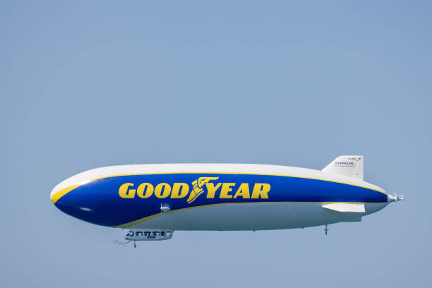 Computer generated 3D illustration with an airship over a desert landscape