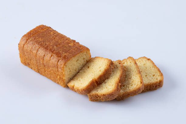istock Sliced butter cake on white background 1429337043