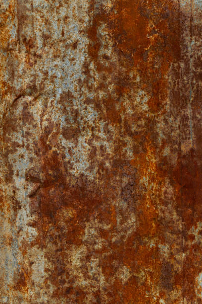istock Rust on the galvanized sheet metal used as a fence outside the building. 1429345714