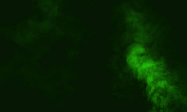 istock Abstract dark background. Green smoke. Science experiment concept. 1429346876