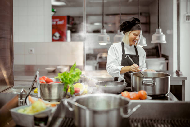 istock Female Cheaf in Professional Kitchen 1429351309