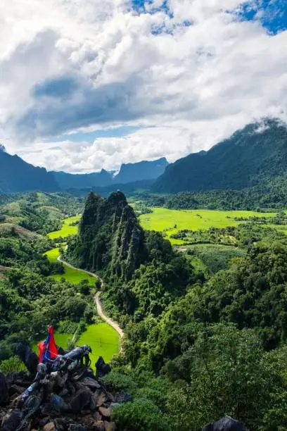 Photo of Motorbike on Top of Nam Xay Mountain, Vang Vieng, Laos PDR, South East Asia. High quality photo