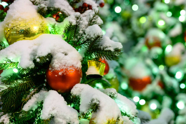 istock Christmas toys in the snow on the tree. 1429365280