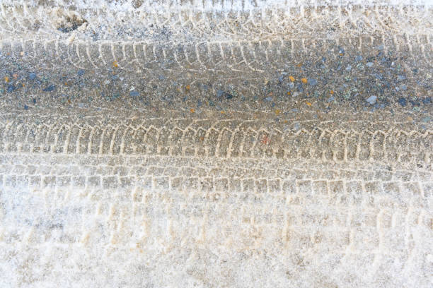 istock Car track in fresh snow 1429367327